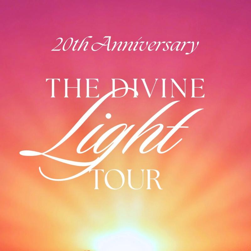 20th Anniversary The Divine Light Tour above sun and orange sky